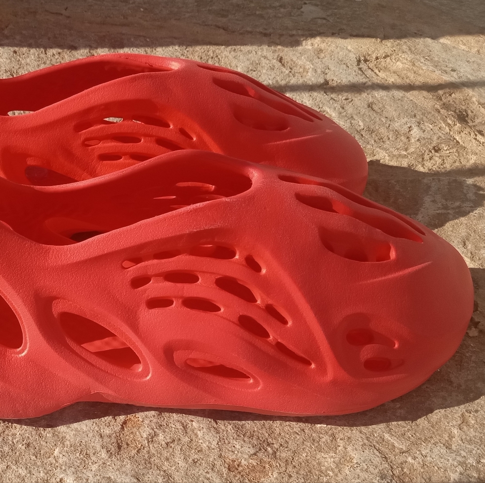 Orange yeezy like foam runner